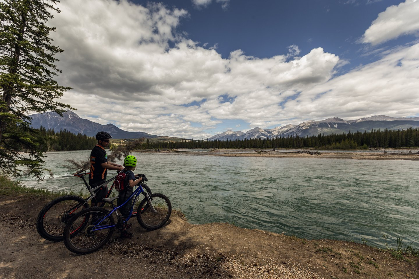 Father and son biking - Credit: Corey Johnn