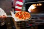 Famoso-PizzaGoinginOven.jpg Famoso-PizzaGoinginOven.jpg