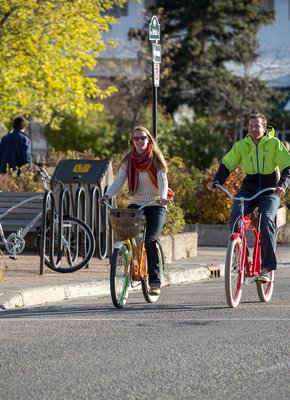 ParksCanada-Two-Young-Adults-Biking-Around-Town-Parks-Canada-Nicole-Gaboury-CR.jpg