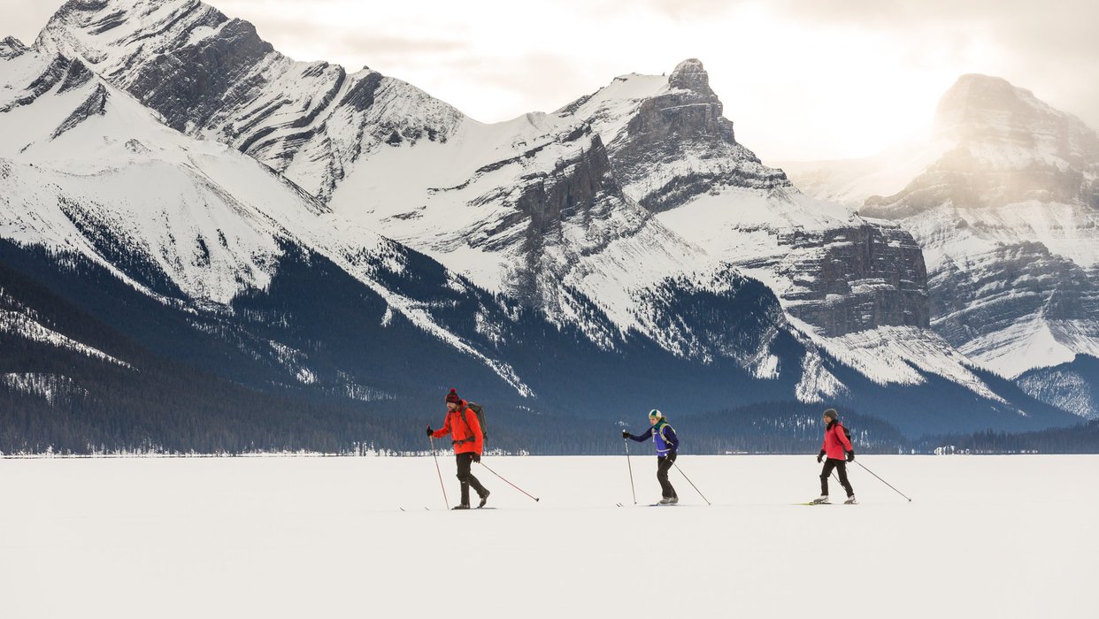 ThreePeopleCrosscountrySkiingatMaligneLake-MatthewClark-@stirlandraephoto-CR-large.jpg